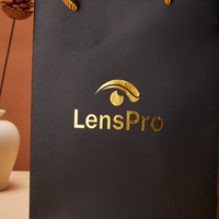 Sac cadeau en papier noir personnalisé avec poignées en ruban pour l'emballage de vêtements, de produits de beauté et de bijoux, vente en gros, haute qualité