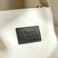 Écussons personnalisés en cuir véritable noir, logo thermocollé, écologiques, pour jeans, sacs, étiquettes, accessoires de vêtements à coudre, vente en gros, OEM
