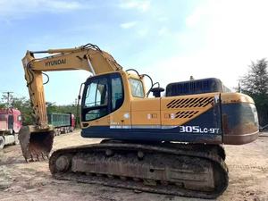 Excavatrice sur chenilles Hyundai 305LC-9T d'occasion de haute qualité, 30 tonnes, avec accessoires : pince, tarière, brise-roche, certifiée CE - Product Image 3