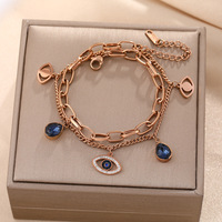 Bracelet en gros Chancy Fashion INS Style plaqué or, chaîne épaisse à double couche, yeux de démon bleus pour unisexe