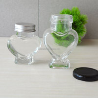 Vente en gros de pots en verre transparent en forme de cœur personnalisés avec impression à l'écran pour gelée et bonbons