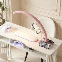 Lampe professionnelle pour technicien ongulaire en forme de demi-lune avec support intégré pour les mains et double support pour téléphone, idéale pour le travail en salon de manucure