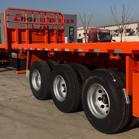 Semi-remorque plateau 2/3/4 essieux, capacité de charge 40/60/80 tonnes pour conteneurs 20ft, 40ft, 45ft et livraison de marchandises en vrac – Vente directe usine