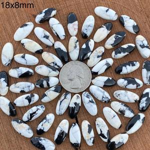 พลอยบัฟฟาโลทรงรีสีขาวและดำธรรมชาติ ขนาด 18x8 มม. คุณภาพเยี่ยมจากทางตอนตะวันตกเฉียงใต้ ปรับขนาดได้อย่างสมบูรณ์แบบ - Product Image 1