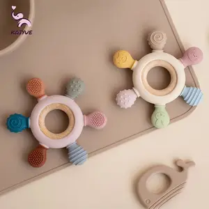 1 Stück Lebensmittelqualität Silikon Zahnstück hölzerne Ring Ruderform BPA-frei Kleinkind kauen Nursing-Spielzeug Neugeborenen-Geschenke für Babyausschnitt