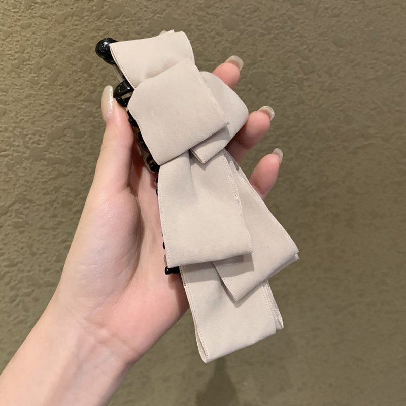 White suede-banana clip