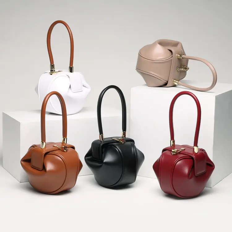 カスタムロゴデザイナー高級レトロ本革餃子ハンドバッグ女性のためのユニークなヴィンテージ財布ハンドバッグ
