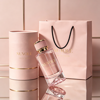 Flacon de parfum de luxe le plus vendu, flacon de parfum vide en verre rose de 50 ml, flacon de parfum rond de 100 ml, flacon de parfum de 30 ml avec emballage