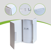 Boîte à parfum haut de gamme blanche à couvercle rabattable avec carte en papier gaufré, emballage monobloc en matériaux recyclés, doublure en éponge, pliables