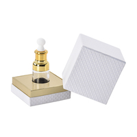 Impression de logo personnalisé 10ml 30ml 50ml 100ml Mini petite boîte d'emballage en carton de luxe pour parfum cosmétique avec couvercle et base