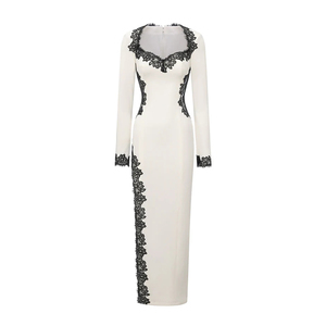 Abito <span class=keywords><strong>lungo</strong></span> bianco e <span class=keywords><strong>nero</strong></span> <span class=keywords><strong>con</strong></span> pizzo a contrasto, maniche lunghe e <span class=keywords><strong>spacco</strong></span> <span class=keywords><strong>laterale</strong></span> - Product Image 1