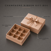 Boîte cadeau rigide personnalisée avec couvercle et base couleur or champagne, avec ruban et insert compartimenté pour chocolats et bonbons
