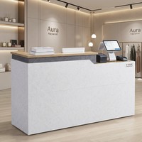 Comptoir de caisse moderne en marbre, anti-salissures, facile d'entretien, avec grand espace de rangement, idéal pour supermarchés et commerces de détail en centre commercial