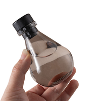 Flacon diffuseur d'huiles essentielles en verre gris rond de luxe, 100 ml, vide, pour aromathérapie, avec couvercle, vente en gros
