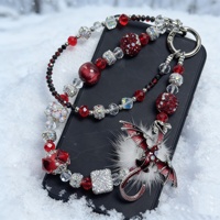 Breloque de téléphone Dragon à ailes rouges et duveteuses, ornée de strass et de perles, avec cordon de poignet pour sac, bijou artisanal pour femme, cadeau