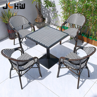 Chaise de restaurant d'extérieur moderne empilable et imperméable en rotin, table à café en aluminium et chaise de salle à manger en osier – Vente directe usine