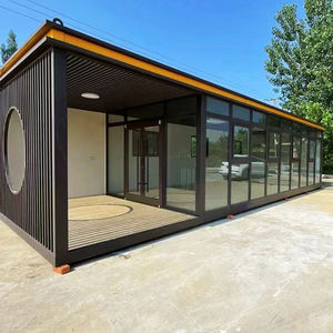 Un magasin <span class=keywords><strong>de</strong></span> conteneurs préfabriqué moderne doté <span class=keywords><strong>de</strong></span> grands présentoirs en verre et d'un design intérieur élégant ; un <span class=keywords><strong>café</strong></span> <span class=keywords><strong>de</strong></span> conteneurs <span class=keywords><strong>de</strong></span> vente au détail. - Product Image 4
