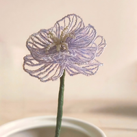 Arrêtez d'acheter des fleurs qui se fanent : investissez dans l'art floral perlé éternel.