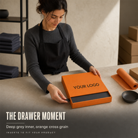 Boîte cadeau coulissante personnalisée en papier grainé orange avec impression de logo noir