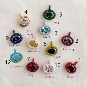 Pendentifs ovales géométriques tendance en cristal de cuivre imperméable, breloques de pierres de naissance aux couleurs variées, pour cadeaux et vente en gros de bijoux - Product Image 6