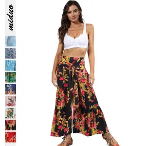 Pantalones holgados de pierna ancha para mujer, pantalón informal elegante con estampado Floral, cintura elástica y volantes, a la moda