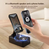 Soporte para Teléfono Celular con Altavoz Inalámbrico (BT5.3), Base Antideslizante, Sonido Envolvente HD, Compatible con Teléfonos Inteligentes iPhone, Batería Recargable