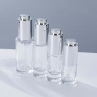 Flacon de lotion en verre transparent haut de gamme avec tête de pompe à pression 20ml/100ml, diffuseur à bâtonnets pour essence faciale de luxe, crème pour le visage, mascara