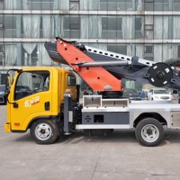 Véhicule de travail aérien à quatre vérins hydrauliques bidirectionnels, avec larges étriers de soutien, portée de 33 m, hauteur maximale de 33 m pour la maintenance des ponts
