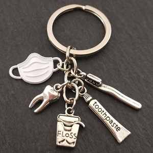 Cepillo de dientes Pasta de dientes Hilo dental Diente Llavero Colgante Cadenas de <span class=keywords><strong>metal</strong></span> Dentista Enfermera Doctor Salud dental Llaveros Bolsa Encanto - Product Image 3
