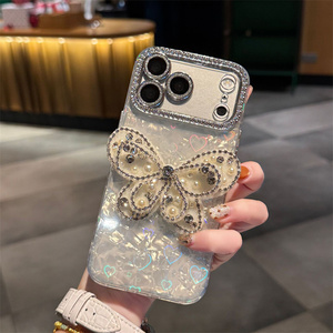 Funda de teléfono con cadena de conchas y lazo de mariposa degradado para iPhone 17 16 15 Pro Max, con dijes de diamante, cubierta trasera brillante con cordón, nueva - Product Image 3