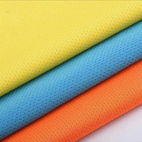 Tissu jersey à motif œil-de-perdrix 150 GSM 100 % polyester tricoté extensible à mini-œillets pour vêtements de sport Dryfit en maille pour filles