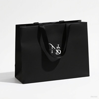 Sacs à provisions de luxe avec logo personnalisé estampage de feuille d'argent ruban de sacs en carton noir écologique pour des promotions personnalisées votre