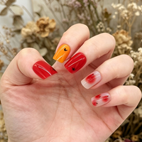 Ongles press-on carrés courts personnalisés en PMMA, design rouge et orange, faux ongles réutilisables