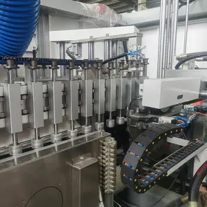 Máquina sopladora de botellas de PET completamente automática con espacio ajustable de 10 cavidades, máquina automática para hacer botellas de PET estirable
