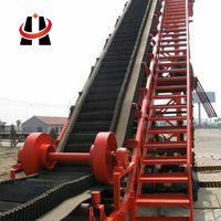 Soluzione con Nastro Trasportatore Antiscivolo per la Movimentazione Sicura di Materiali Granulari Sfusi su Rampe Ripide