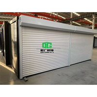 Maison conteneur double pour garage extérieur avec portes à volets roulants Acier extensible et panneau sandwich