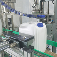 Ligne de traitement d'emballage automatique de haute qualité pour le remplissage, le bouchage et l'étiquetage des barils et bouteilles d'huile alimentaire, haute sécurité