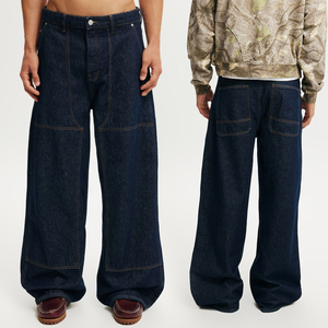 กางเกงยีนส์ทรงหลวมขาบานคุณภาพสูงสำหรับผู้ชาย แบรนด์ KingSen ตกแต่งด้วยผ้าปะติดปะต่อ ดีไซน์ยีนส์ดิบหนา สไตล์ Y2K สตรีทแวร์ แนวเรโทร เหมาะสำหรับใส่ทำงาน - Product Image 1