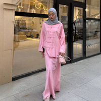 Nouvel ensemble décontracté deux pièces pour femme, chemise boutonnée à manches longues irrégulières et jupe longue, collection été 2026, style transfrontalier