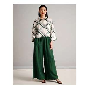 กางเกงลำลองผ้าระบายอากาศสำหรับผู้หญิง ให้ความรู้สึกเบาสบาย ทรงหลวม และเคลื่อนไหวง่าย เหมาะสำหรับการนั่งหรือยืนเป็นเวลานาน - Product Image 4