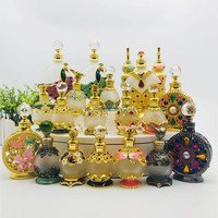 Bouteilles d'attar fantaisie en alliage or noir 15ml avec bâton en verre bouteille d'huile de parfum en verre en Stock