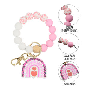 <span class=keywords><strong>Grossiste</strong></span> Bracelet de perles de <span class=keywords><strong>silicone</strong></span> à la mode Porte-clés Saint Valentin en bois personnalisé Porte-clés en bois avec impression UV pour porte-clés en métal - Product Image 5