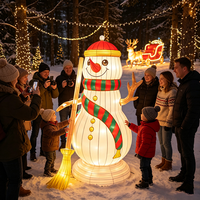 Grandes décorations lumineuses de Noël en forme de traîneau et de rennes, lanternes de carrosse du Père Noël pour les expositions extérieures de fêtes de fin d'année