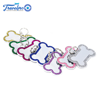 Nouvelle médaille d'identification pour chien en alliage de zinc durable, anti-perte, en forme d'os, gravée au laser, promotionnelle, avec pendentif métallique.