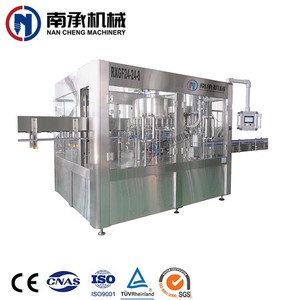 Línea de máquina de llenado y cierre de botellas de jugo de fruta de botellas de líquido de cabeza comercial pequeña completamente automática - Product Image 1