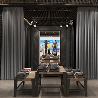 Présentoir de magasin de vêtements haut de gamme avec cabine d'essayage Étagères murales de vêtements en îlot en bois personnalisées vitrine en verre métallique