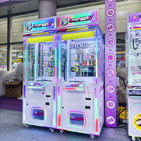 Machine à monnayeur à prix gagnants Naughty Dog pour parcs d'attractions, magasins et centres commerciaux, 1 joueur, garantie 1 an, 110/220V, personnalisable