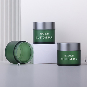 Tarros de plástico personalizados Sanle, verdes esmerilados con tapas electrochapadas para cremas faciales y contenedores de crema para ojos. - Product Image 1