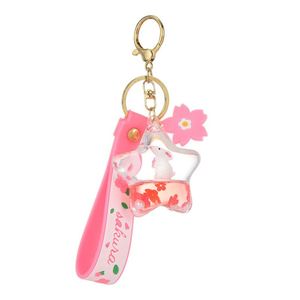 <b>Floating</b> Sequins Acrylic Pentagram Rocket Keyring Liquid Oil Quicksand Bottle Keychain Women Bag Pendant Gift - Product Image 1