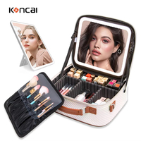 Boîte de toilette de voyage personnalisée à surface douce au toucher, sac à maquillage portable en cuir PU imperméable avec miroir LED pour maquilleur